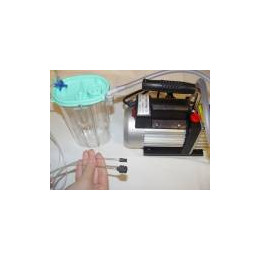 pompe d'aspiration pour le nettoyage de cartouches